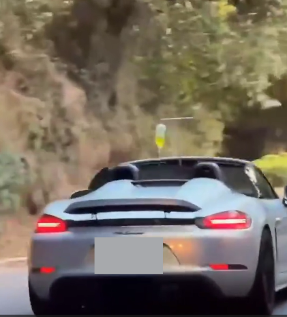 敞篷保時捷掛點滴上路引熱議　行車安全與醫療風險成焦點