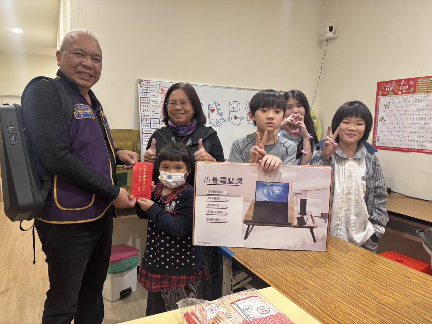 阿里山國際同濟會歲末送暖，水上兒少站感恩餐會溫馨舉行，攜手億載會贈愛心加菜金與設備到位